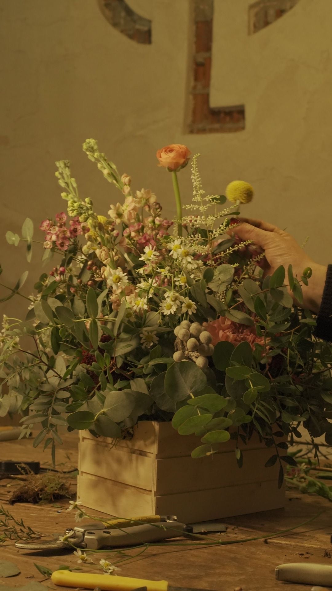 Flowers among friends in workshop